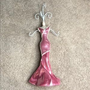 Mannequin jewelry holder with pink dress